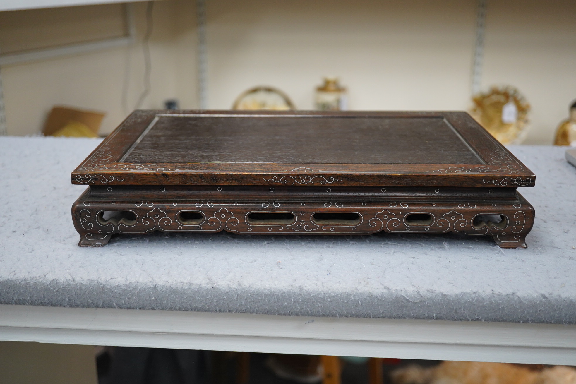 A Chinese silver wire inlaid hardwood stand, late 19th century